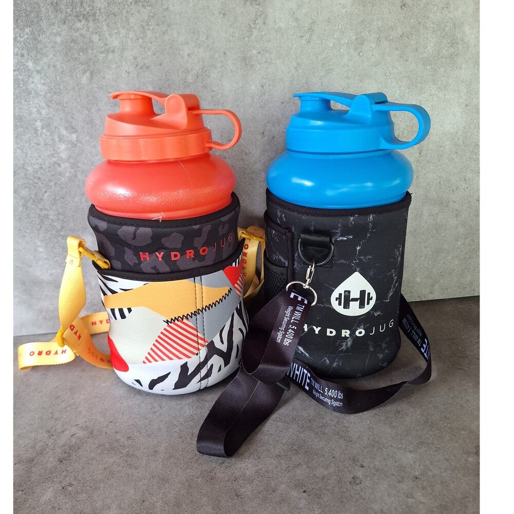 HydroJug lot of 2 73oz big water jugs w neoprene covers cases w straps blue pink